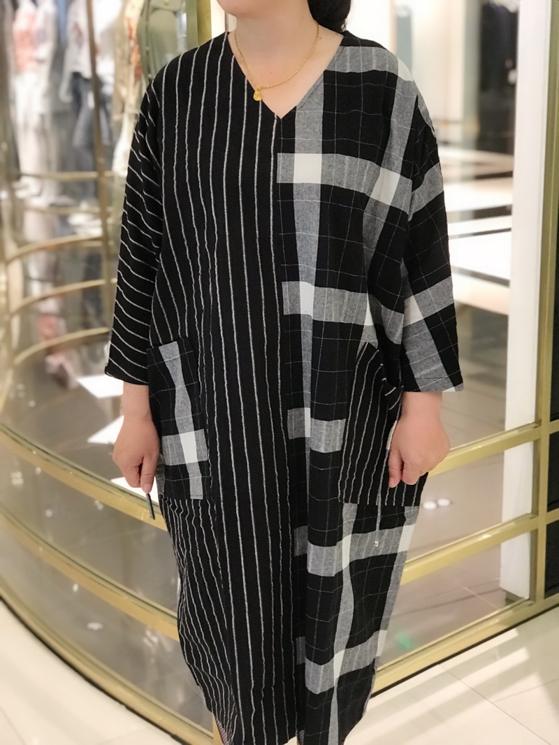 The dress is well made & the material is really nice quality. Loose but not shapeless.