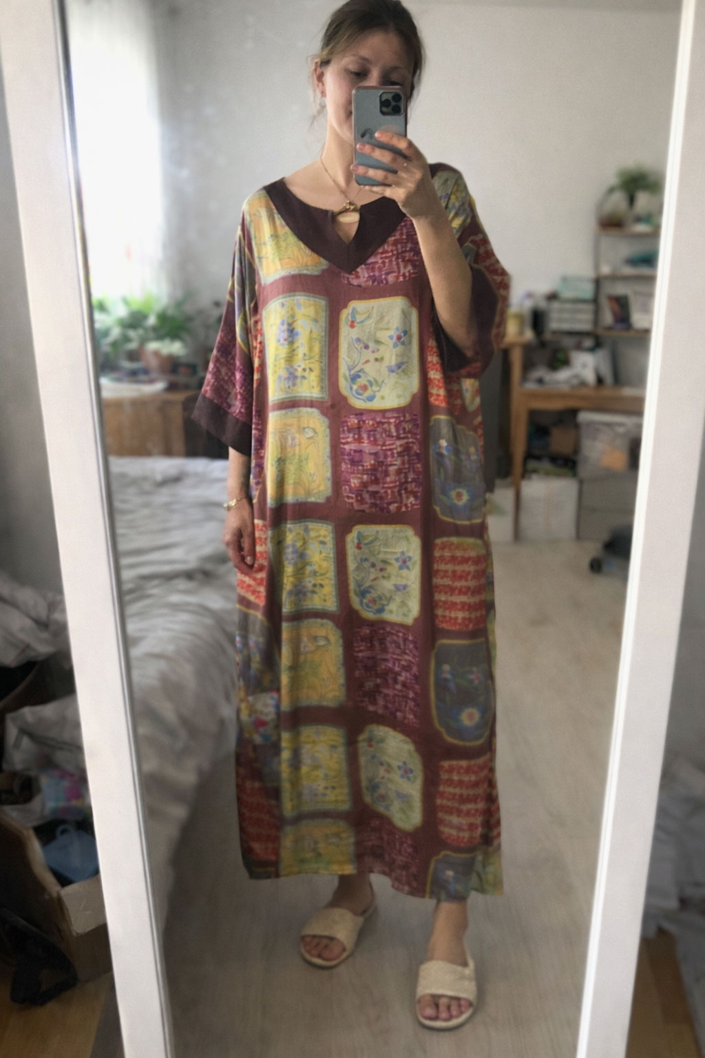 Fits perfectly, but the sleeves are a bit loose for my taste.